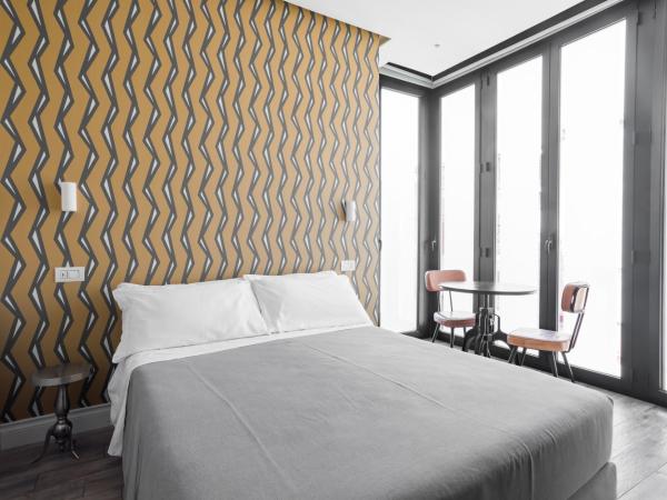 Weaver Suites By Dimorra : photo 5 de la chambre chambre lit king-size