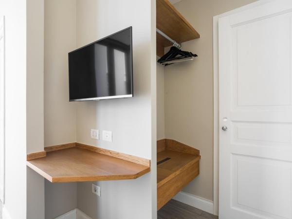 Weaver Suites By Dimorra : photo 1 de la chambre chambre lit king-size