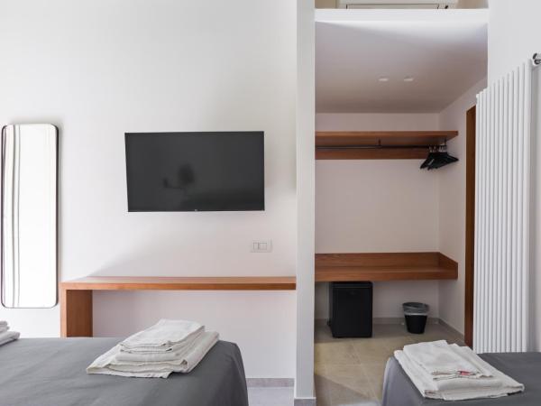 Weaver Suites By Dimorra : photo 3 de la chambre chambre triple