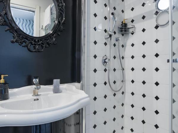 Weaver Suites By Dimorra : photo 7 de la chambre chambre triple exécutive