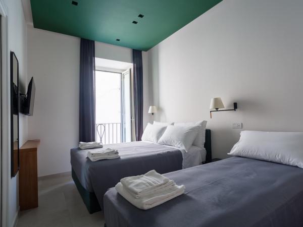 Weaver Suites By Dimorra : photo 1 de la chambre chambre triple classique