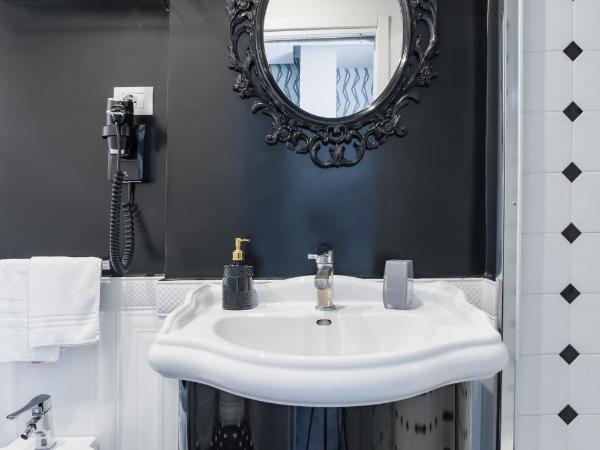 Weaver Suites By Dimorra : photo 5 de la chambre chambre triple exécutive