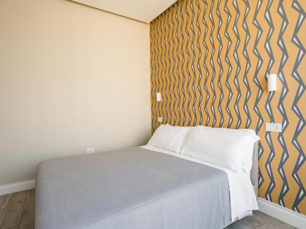 Weaver Suites By Dimorra : photo 6 de la chambre chambre lit king-size