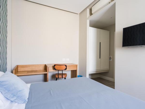 Weaver Suites By Dimorra : photo 1 de la chambre chambre triple exécutive