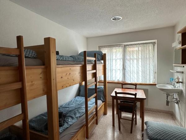 Touristenheim Bergfreude : photo 2 de la chambre chambre quadruple avec salle de bains commune