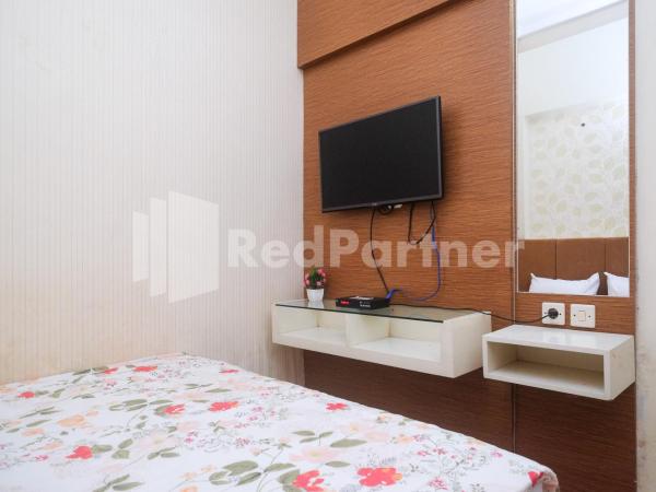Tatti Inn Syariah Seturan RedPartner : photo 4 de la chambre chambre double standard