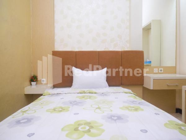 Tatti Inn Syariah Seturan RedPartner : photo 9 de la chambre chambre simple