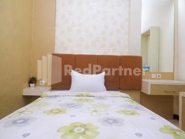Tatti Inn Syariah Seturan RedPartner : photo 8 de la chambre chambre simple
