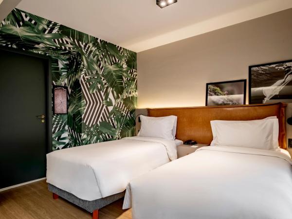 Grand Mercure SP Itaim Bibi : photo 1 de la chambre chambre lits jumeaux deluxe avec balcon
