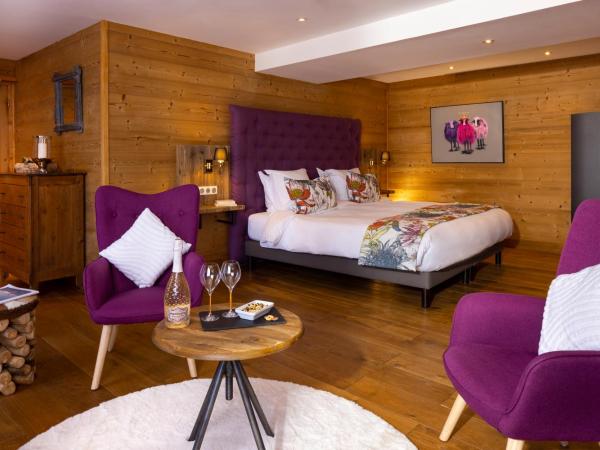 Hôtel Courcheneige : photo 1 de la chambre suite lit king-size