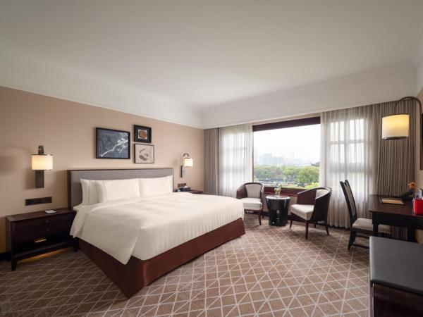 Pan Pacific Suzhou : photo 1 de la chambre hébergement premier lit king-size avec vue 