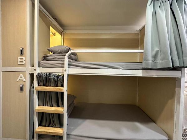 Forest Hostel Shanghai Jing'an : photo 1 de la chambre chambre quadruple avec salle de bains commune