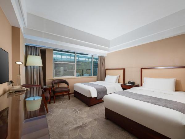 Zhongyi Hotel - Guangzhou Feixiang Park Metro Station Wanda Plaza : photo 4 de la chambre chambre lits jumeaux supérieure