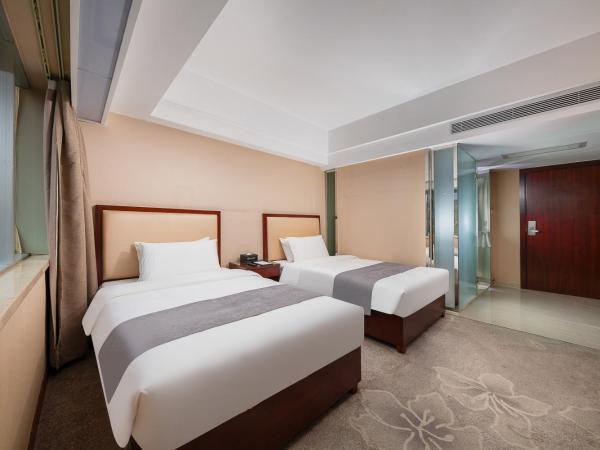 Zhongyi Hotel - Guangzhou Feixiang Park Metro Station Wanda Plaza : photo 3 de la chambre chambre lits jumeaux supérieure
