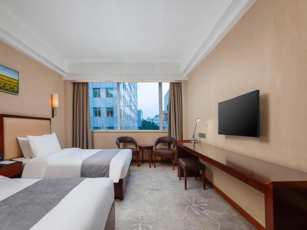 Zhongyi Hotel - Guangzhou Feixiang Park Metro Station Wanda Plaza : photo 3 de la chambre chambre lits jumeaux deluxe