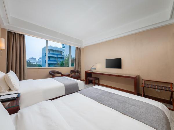 Zhongyi Hotel - Guangzhou Feixiang Park Metro Station Wanda Plaza : photo 2 de la chambre chambre lits jumeaux deluxe