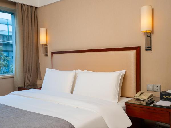 Zhongyi Hotel - Guangzhou Feixiang Park Metro Station Wanda Plaza : photo 3 de la chambre chambre lit queen-size deluxe