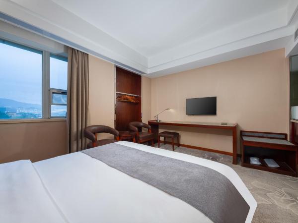 Zhongyi Hotel - Guangzhou Feixiang Park Metro Station Wanda Plaza : photo 2 de la chambre chambre lit queen-size deluxe
