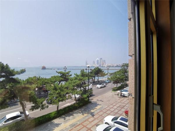 Qingdao Oceanwide Elite Hotel : photo 3 de la chambre chambre affaires lits jumeaux - vue sur mer