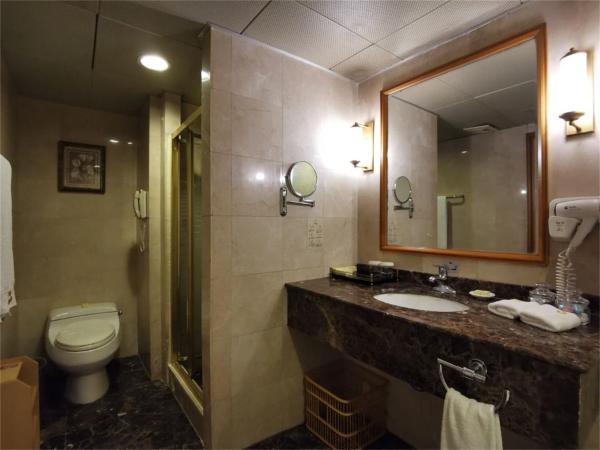 Qingdao Oceanwide Elite Hotel : photo 1 de la chambre chambre double affaires - vue sur mer