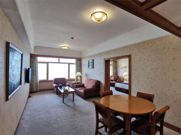 Qingdao Oceanwide Elite Hotel : photo 4 de la chambre suite exclusive