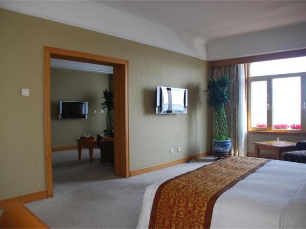 Qingdao Oceanwide Elite Hotel : photo 2 de la chambre suite exclusive