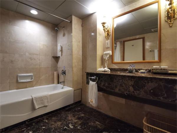 Qingdao Oceanwide Elite Hotel : photo 4 de la chambre suite familiale