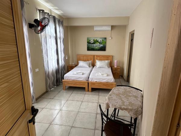 Eleganz Residence : photo 5 de la chambre chambre lits jumeaux avec salle de bains privative