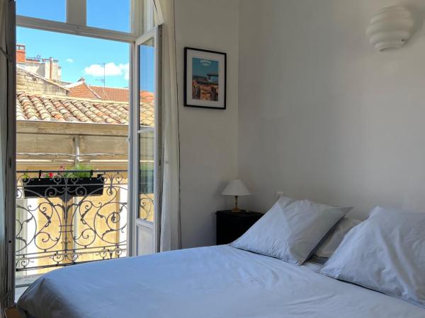 Au cœur de M : photo 1 de la chambre chambre double avec balcon