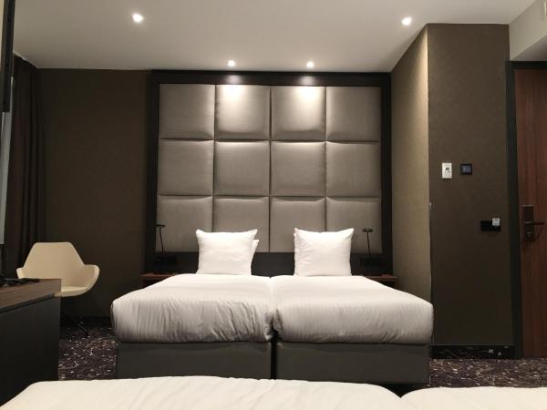 Hotel Levell : photo 1 de la chambre chambre quadruple