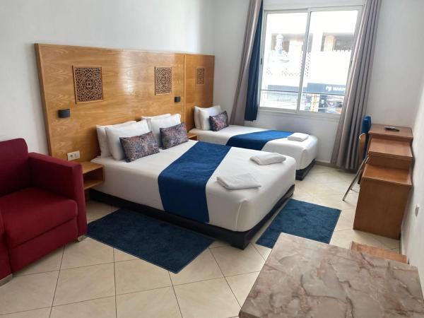 Hotel Miramar : photo 3 de la chambre chambre triple supérieure - vue sur mer