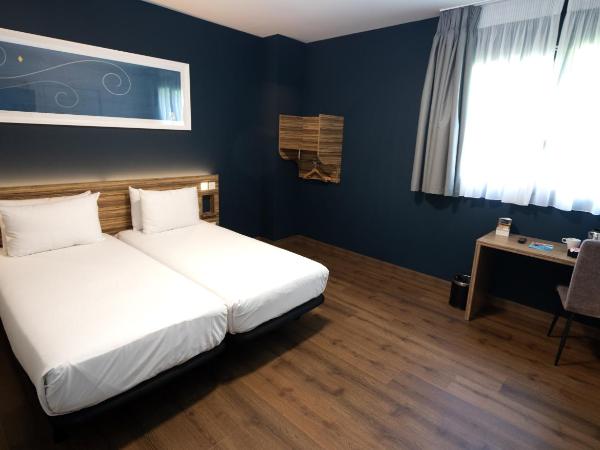 Travelodge Madrid Metropolitano : photo 2 de la chambre chambre double ou lits jumeaux - accessible aux personnes à mobilité réduite