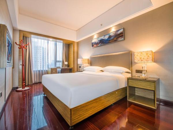 La Perle International Hotel - Free shuttle between hotel and Exhibition Center during Canton Fair & Exhibitor registration Counter : photo 3 de la chambre suite 2 chambres
