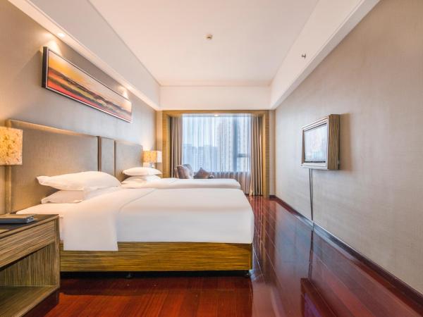 La Perle International Hotel - Free shuttle between hotel and Exhibition Center during Canton Fair & Exhibitor registration Counter : photo 6 de la chambre suite 2 chambres