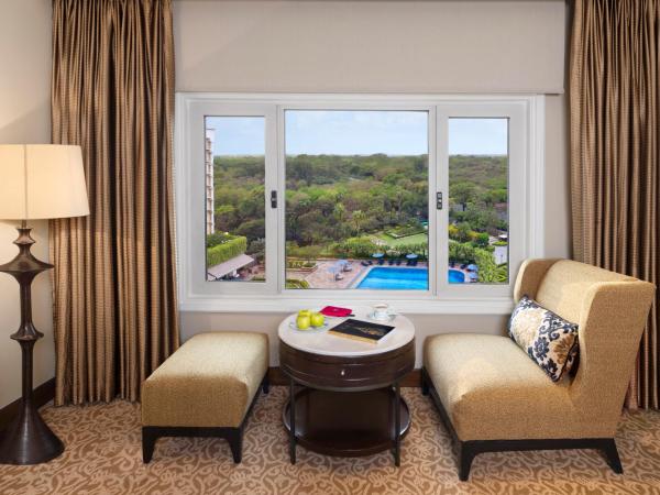 Taj Palace, New Delhi : photo 6 de la chambre taj club suite king bed forest and pool view