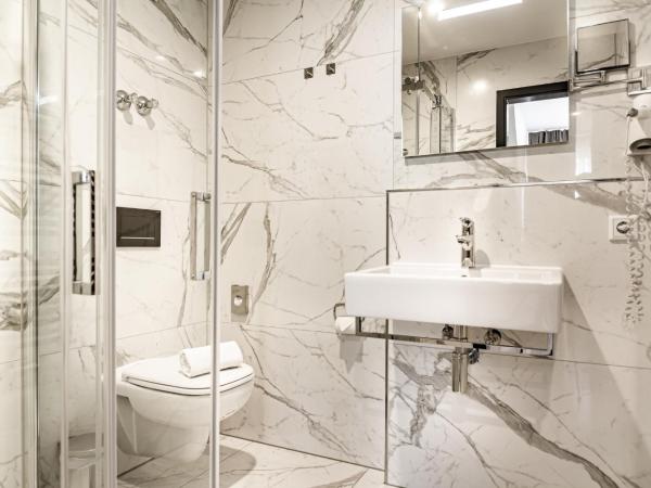 Sleep Inn Düsseldorf : photo 4 de la chambre chambre lit king-size deluxe