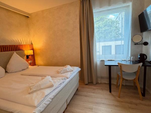 dingdong bonn - city apartments : photo 9 de la chambre chambre double ou lits jumeaux