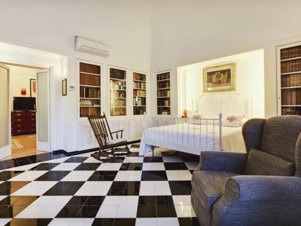 Suite Villa Carolina : photo 5 de la chambre chambre double - vue sur piscine