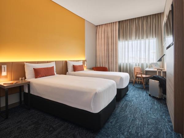 Rydges Sydney Airport Hotel : photo 1 de la chambre chambre lits jumeaux deluxe