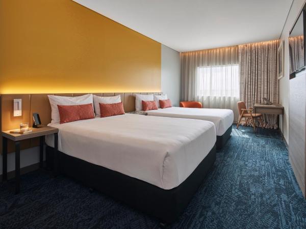 Rydges Sydney Airport Hotel : photo 1 de la chambre chambre deluxe avec 2 lits queen-size