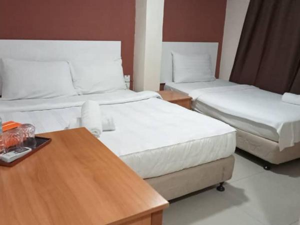 Hotel at Malabar Buiding Masjid India : photo 1 de la chambre chambre triple Économique