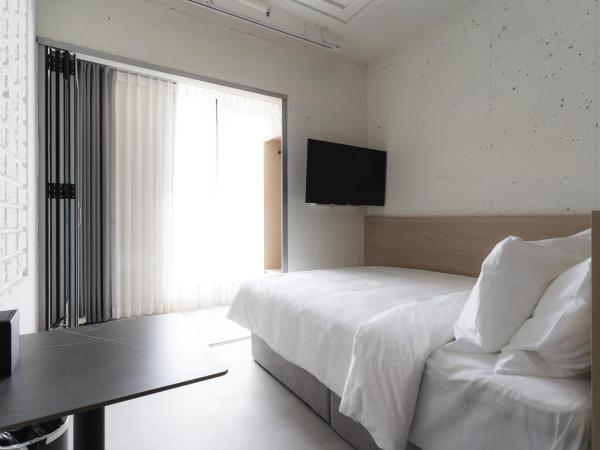 Homes Stay G-Valley Gasan : photo 3 de la chambre chambre double standard