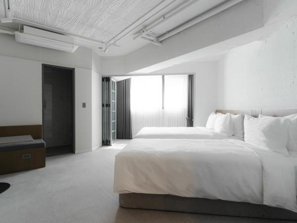 Homes Stay G-Valley Gasan : photo 3 de la chambre chambre lits jumeaux