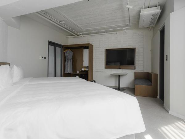 Homes Stay G-Valley Gasan : photo 2 de la chambre chambre lits jumeaux