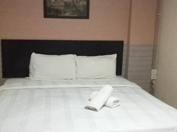 Hotel at Malabar Buiding Masjid India : photo 2 de la chambre chambre triple Économique