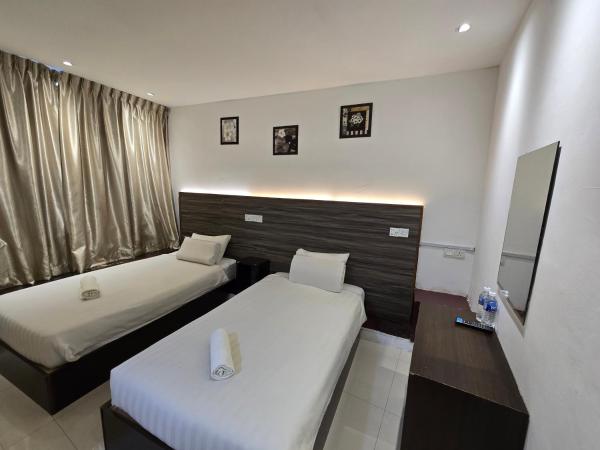 One Point Hotel : photo 1 de la chambre chambre lits jumeaux