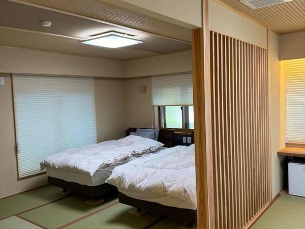 Oshi Ryokan : photo 1 de la chambre chambre lits jumeaux