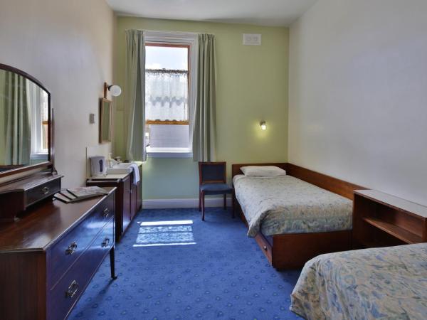 Astor Private Hotel : photo 5 de la chambre chambre simple standard avec salle de bains commune