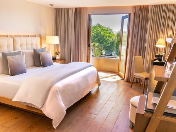 Cartesiano Boutique & Wellness Hotel : photo 1 de la chambre chambre lit king-size avec balcon