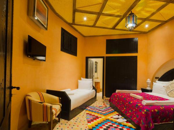 Lodge Ikalimo : photo 9 de la chambre chambre triple deluxe